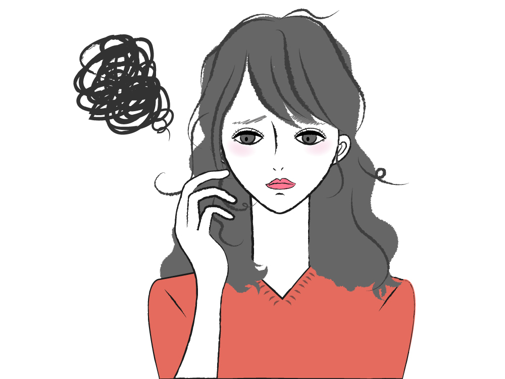 くせ毛に悩んでいる女性